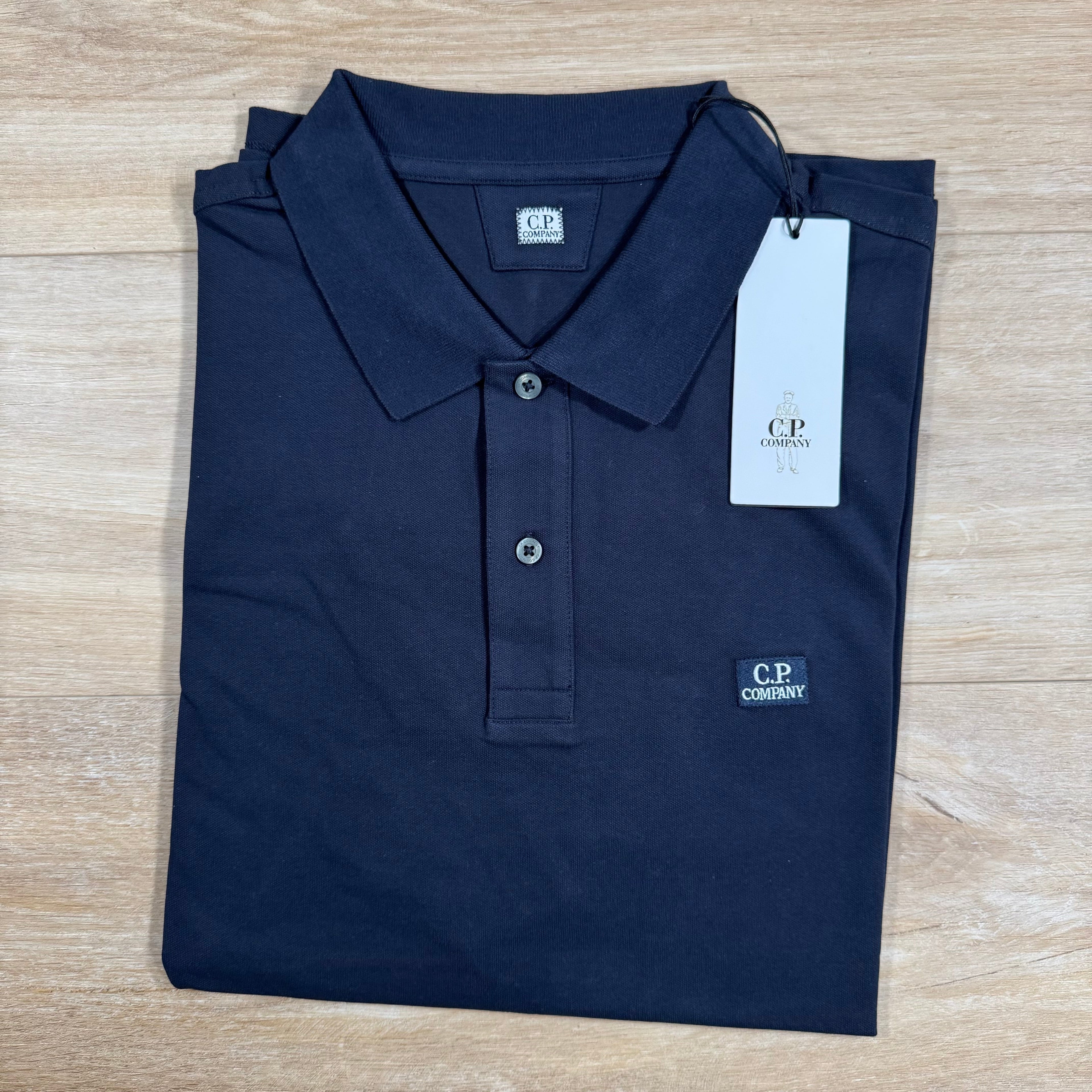 CP Company Stretch Piquet Logo Polo Shirt in Black Sand